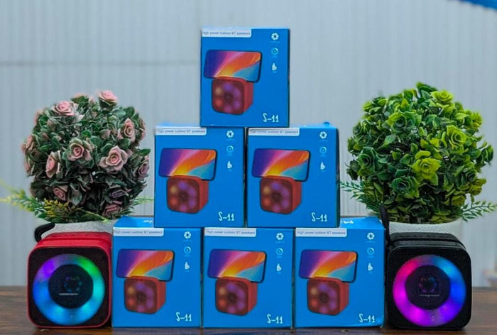 S11 Mini Portable Bluetooth Speaker With Phone Holder, RGB Lights, Super Bass & 10-Hour Playtime – Compact Travel Wireless Speaker (Random Color)